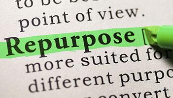 Highlighting content repurposing strategies on a piece of paper.