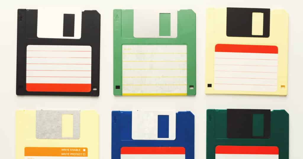 Old floppy disks isolated on white background.