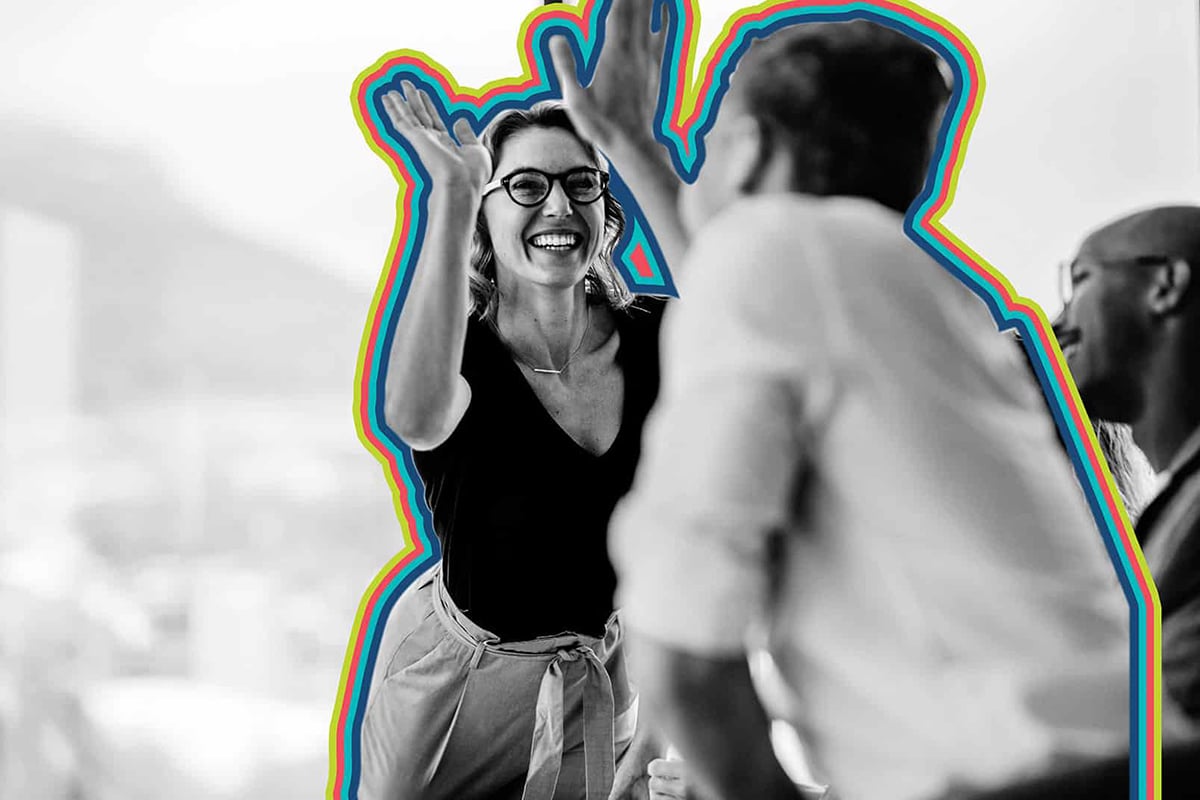 Motivated customers giving each other a high five.