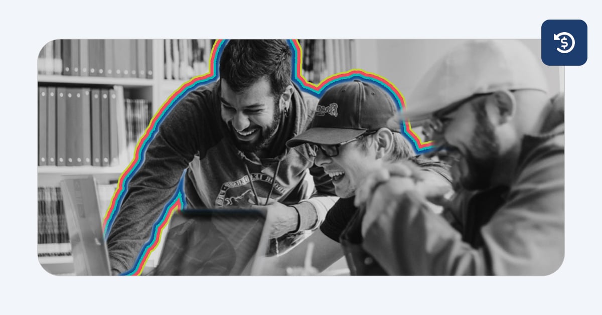 A crowd of marketers excitedly huddle around a laptop to illustrate teams expanding sales pipeline