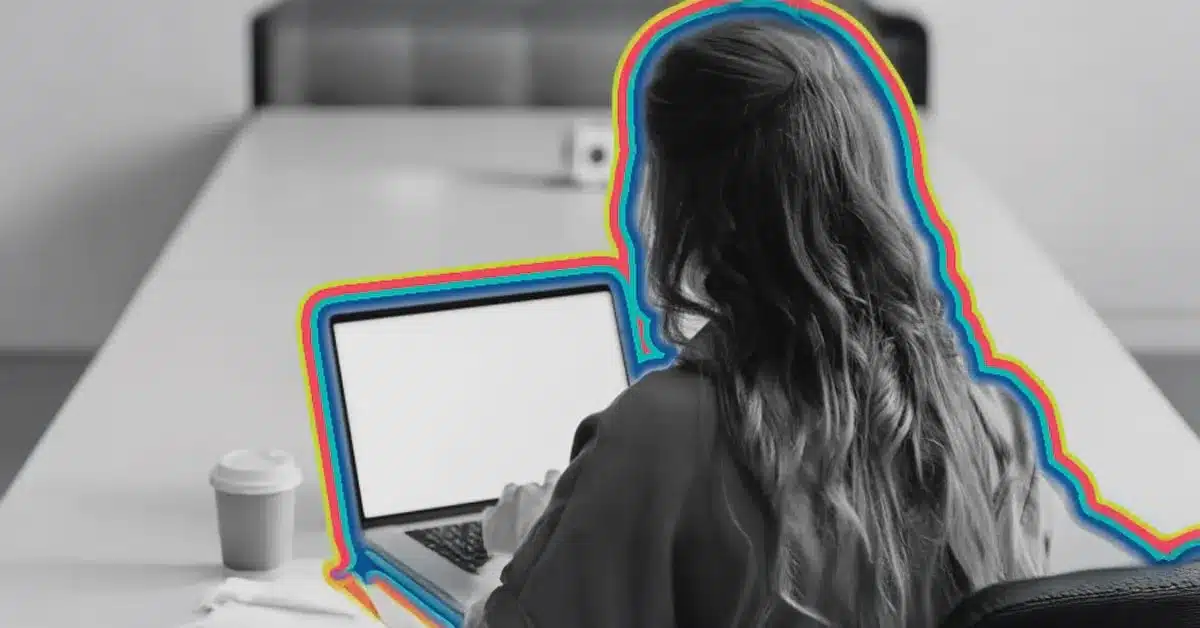 automated customer segmentation illustrated by an image of a woman looking at a laptop