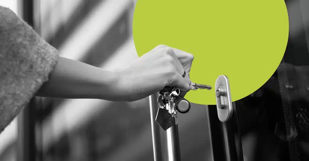 Gmail Manage Subscriptions feature illustrated by a hand bringing keys up to a lock.